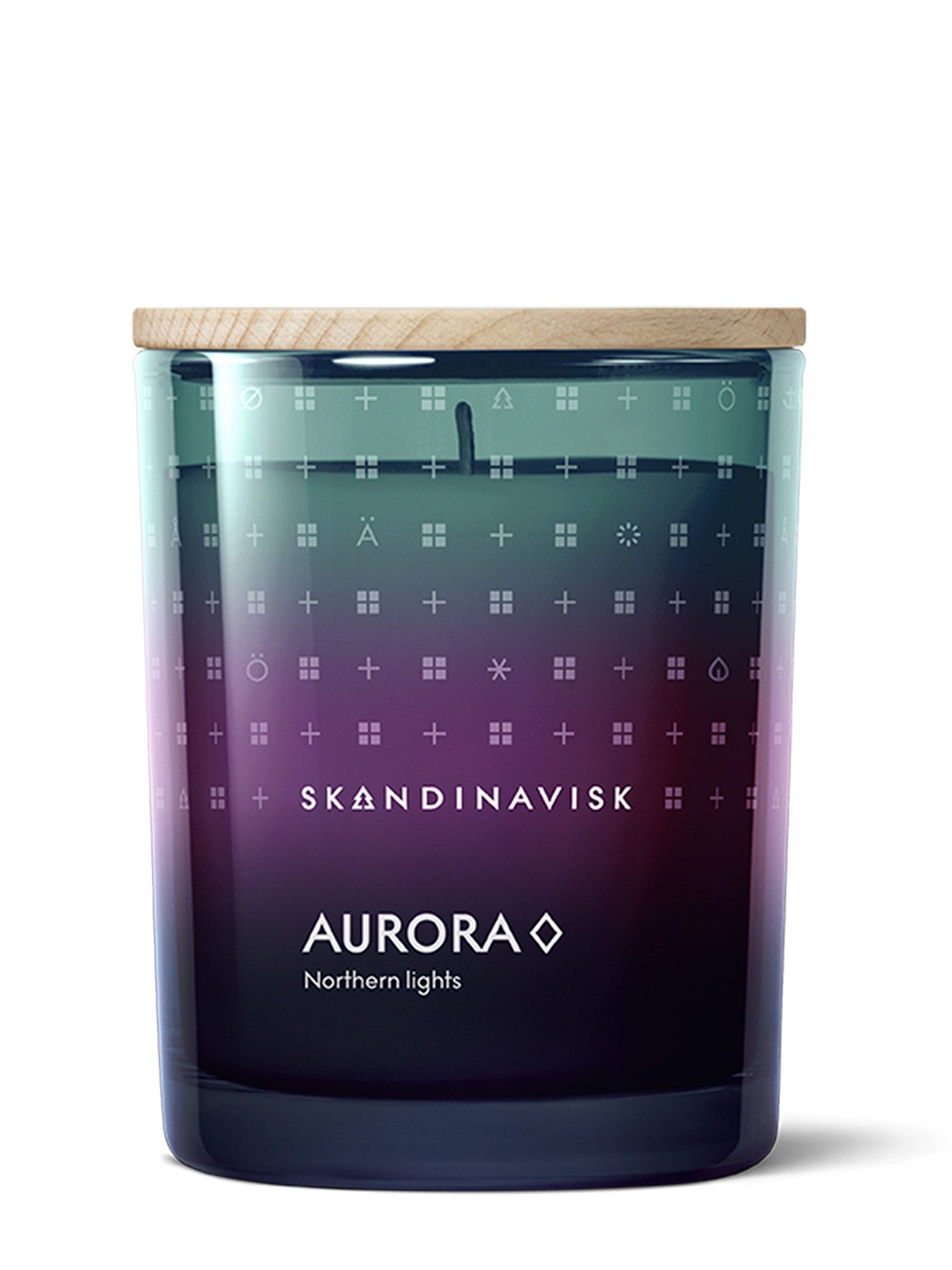 Duftlys AURORA i mørk glasskrukke med blå-lilla mønster og brennende veke
