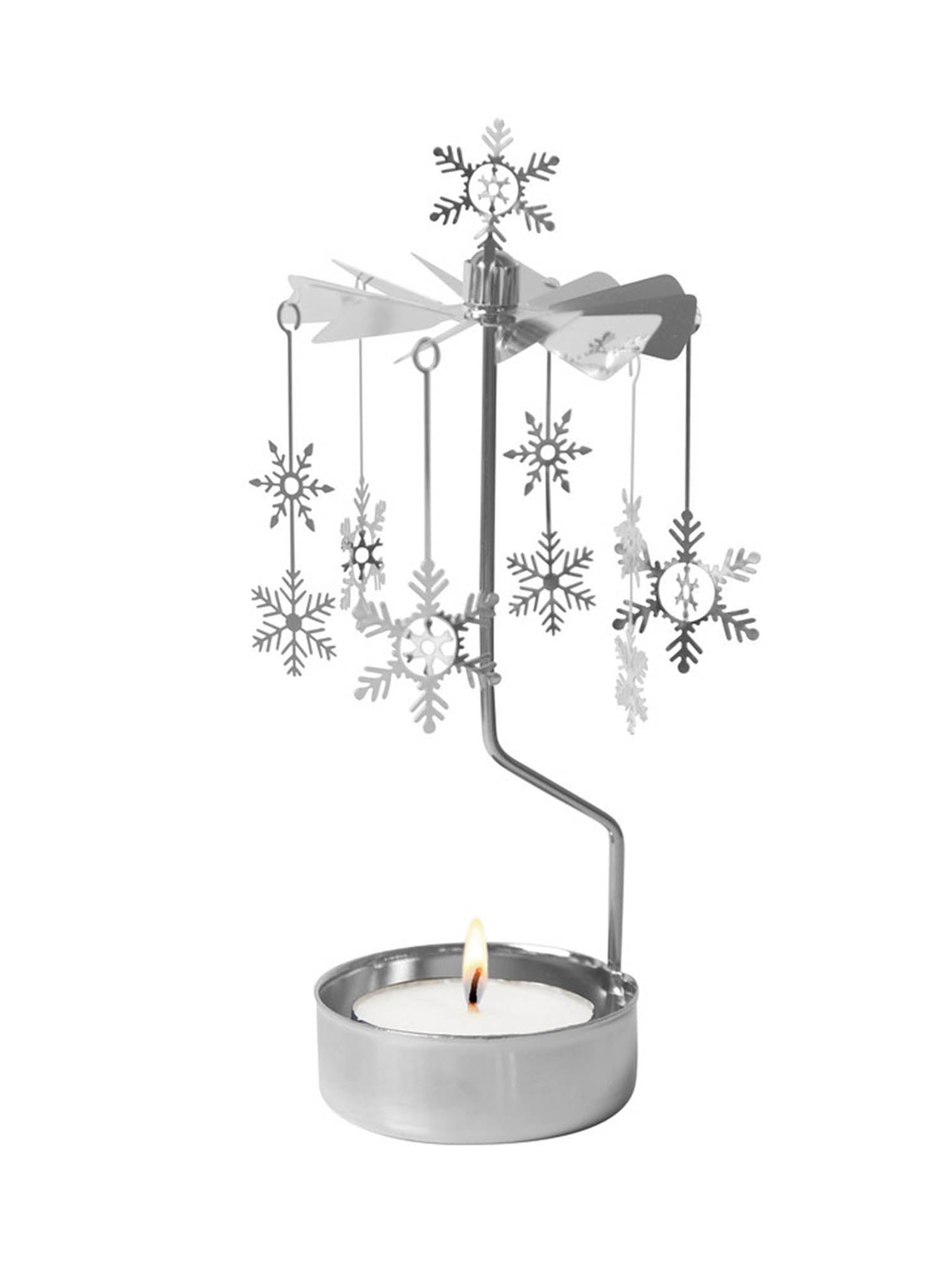 Telys-spinner med snøfall, metallstativ med snøfnugg som henger over tent telysholder