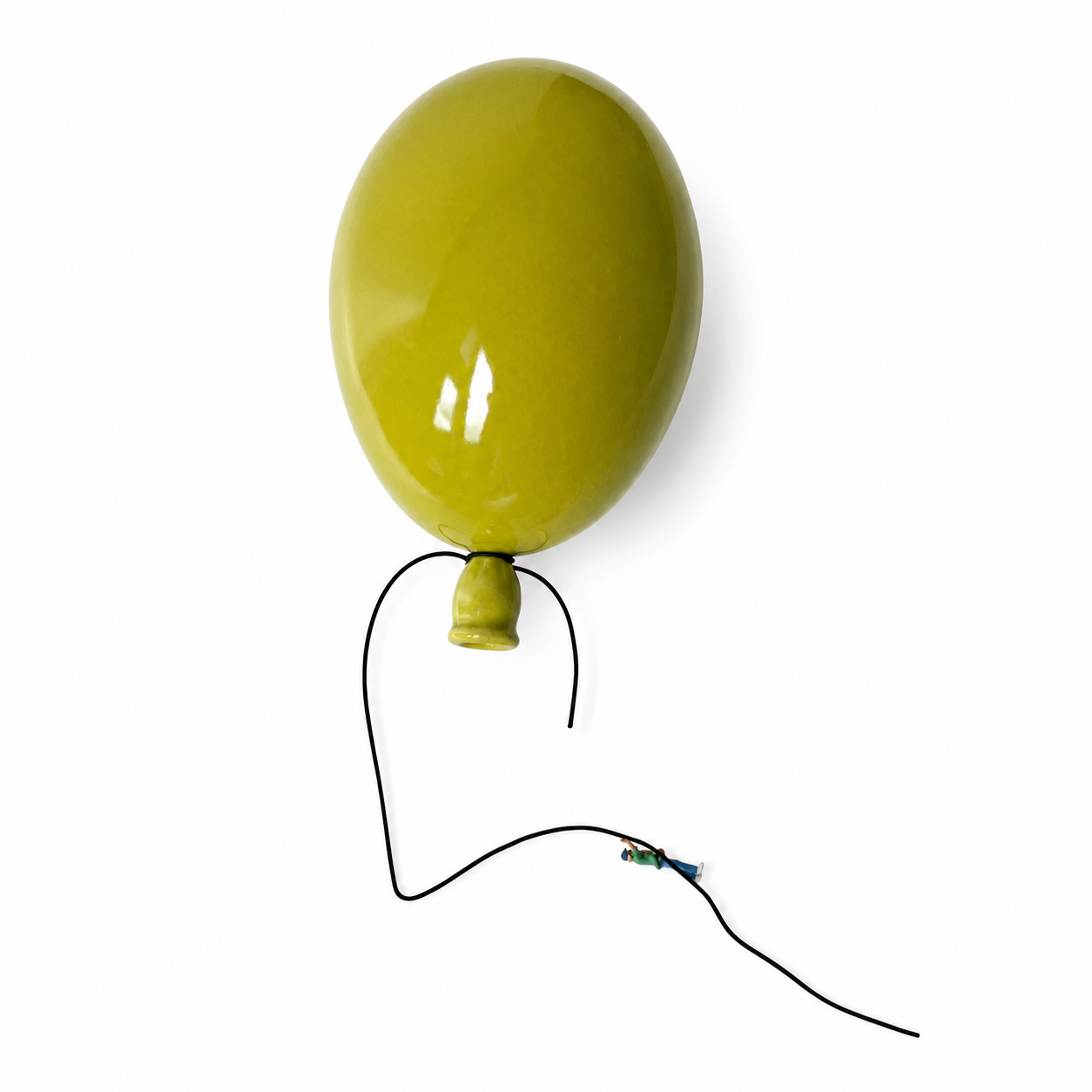 Gulgrønn ballong med snor og liten knute