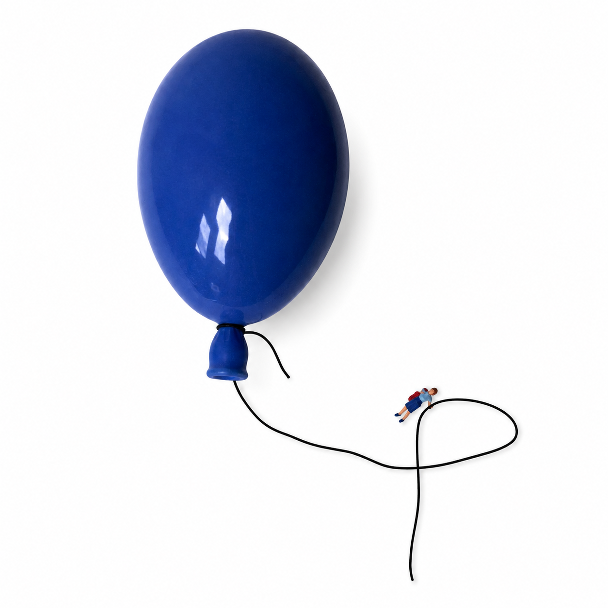 Blå ballong med snor og tut