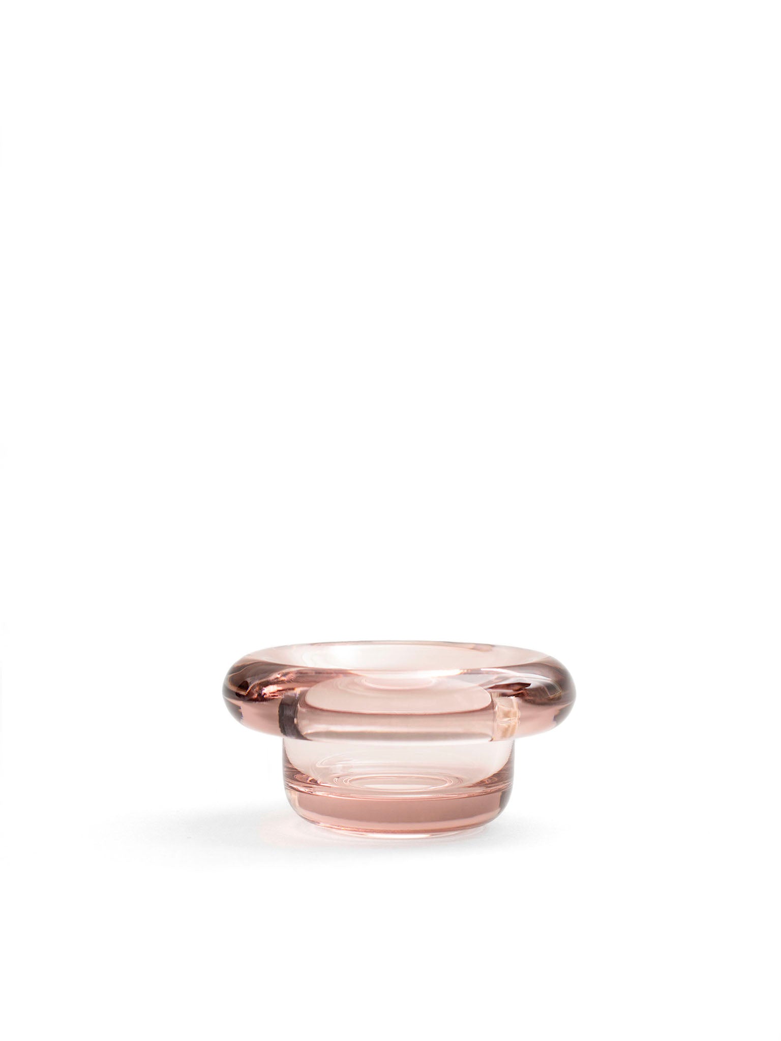 Sirkel lysestake i rosa glass med bred, rund åpning
